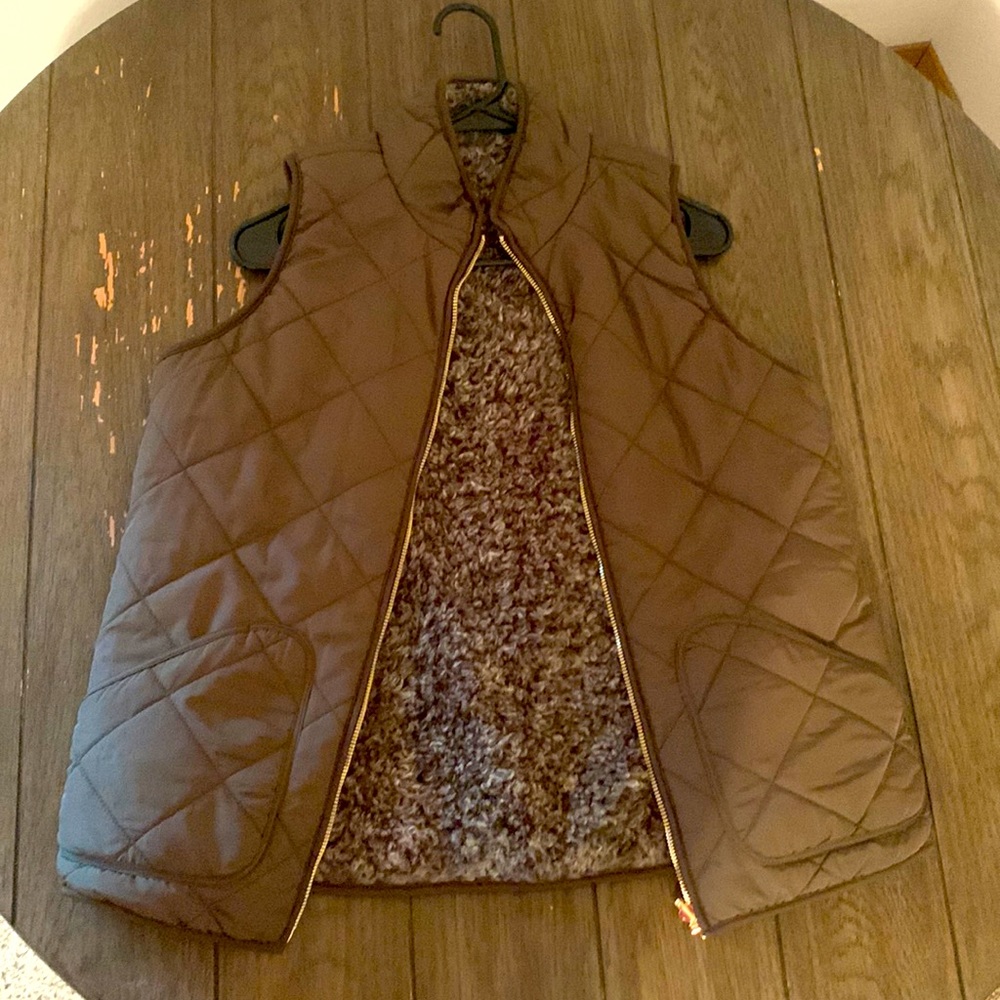 Army green vest with Sherpa on the inside